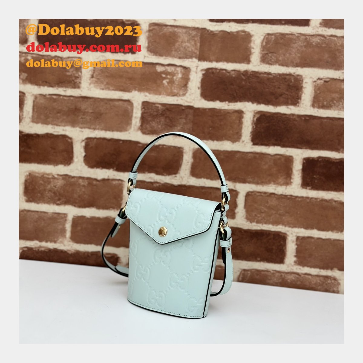 Gucci 772795 UK Embossed Top Handle Replicas Shoulder Bag