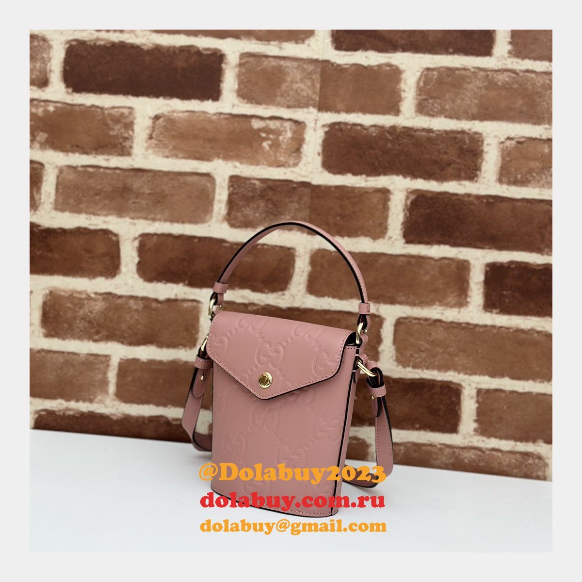 Gucci 772795 UK Embossed Top Handle Replicas Shoulder Bag